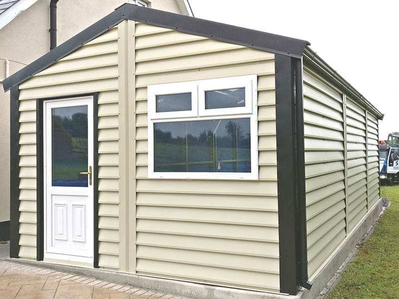 9.2m x 5m Silver Range with Mushroom Plank Effect upgrade and roller door to the back Shanette Sheds
