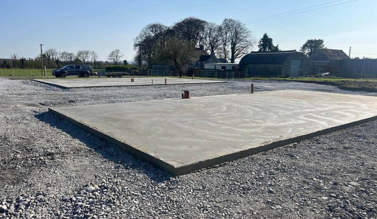 Concrete base with overhang method for Shanette insulated steel shed
