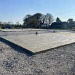 Concrete base with overhang method for Shanette insulated steel shed