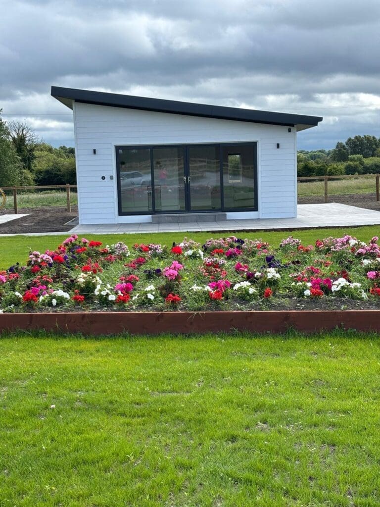 Exterior view of insulated steel chalets converted into holiday lets