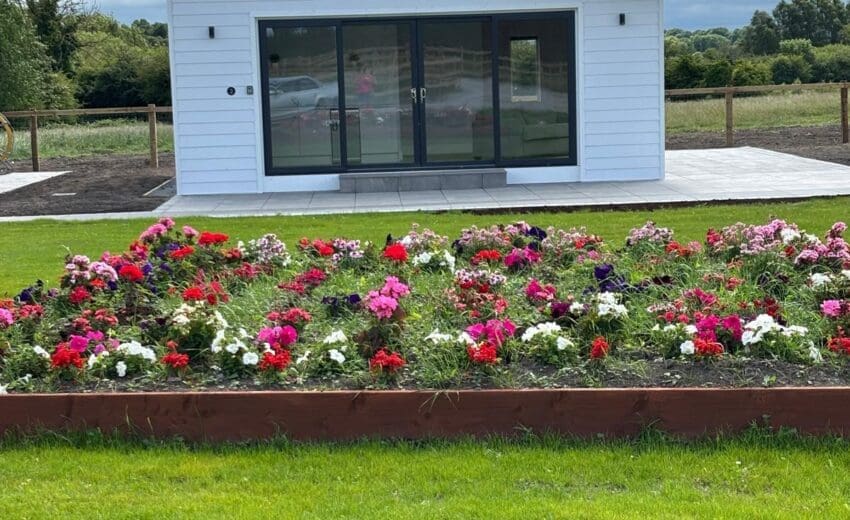 Insulated steel garden chalet in Kildare overclad with white kerrafront cladding
